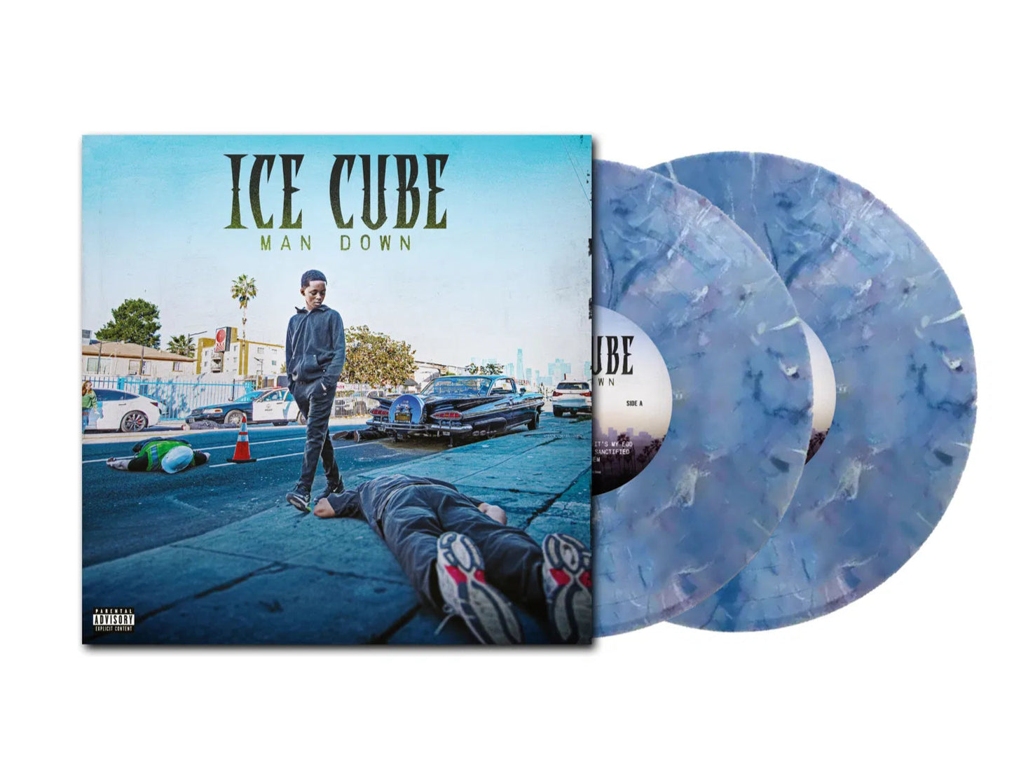 Vinyl record with 'Ice Cube' album cover showing a person lying on the ground Man down - and a car in the background.